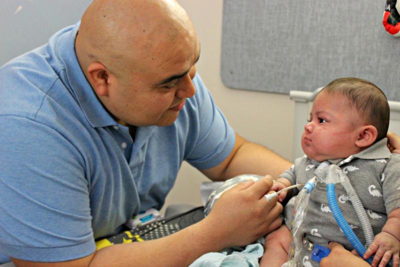 a man and an infant